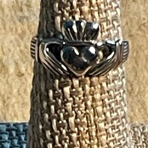 This is a size 7  Celtic Claddaugh ring 925 silver has partial stamp in band
